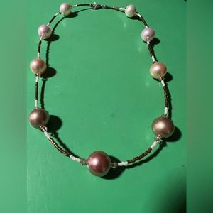 I called this one floating pearls. Petite beaded necklace with larger pearls.